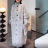 Gray knitted cardigan for women, featuring high collar and oversized fit, perfect for stylish layering and everyday wear.