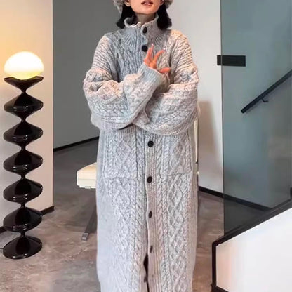 Gray knitted cardigan for women, featuring a high collar and loose fit, perfect for a cozy and stylish look.